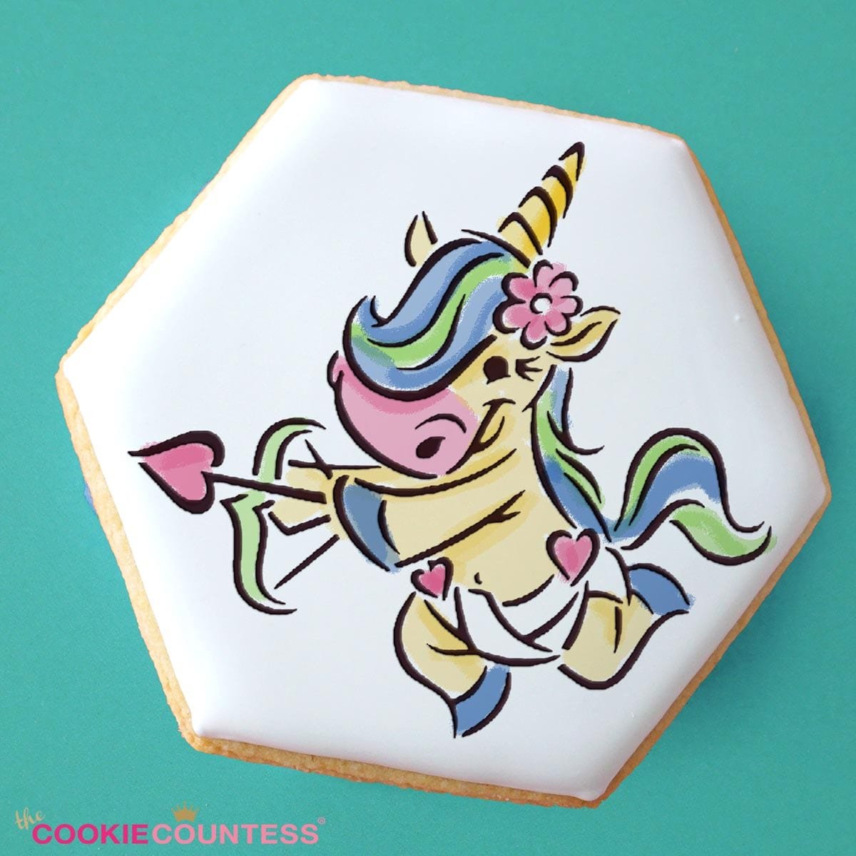 Koekje gedecoreerd met de cupido-eenhoorn van de Cupid Unicorn PYO stencil