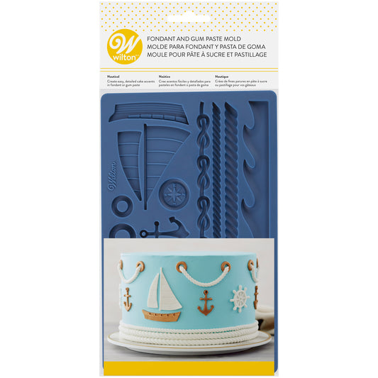 Wilton fondant mal met maritieme figuren zoals anker en stuurwiel