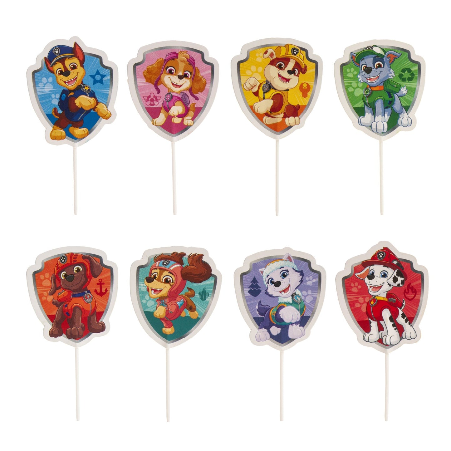 Paw Patrol taarttoppers van Dekora in cupcakes geprikt op een feesttafel