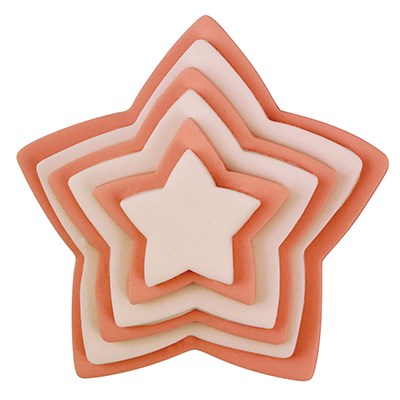 Oranje en witte fondant sterren gemaakt met de PME ster uitsteker set
