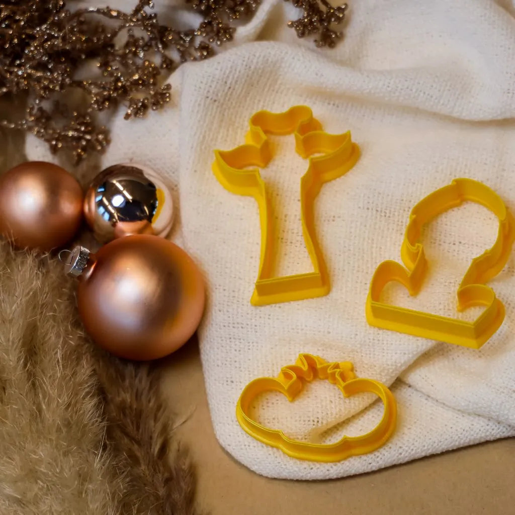 Drie losse safari koekjesuitstekers van Cup of Cookies - giraffe, leeuw en aap uitsteker in geel, 3D geprint en voedselveilig