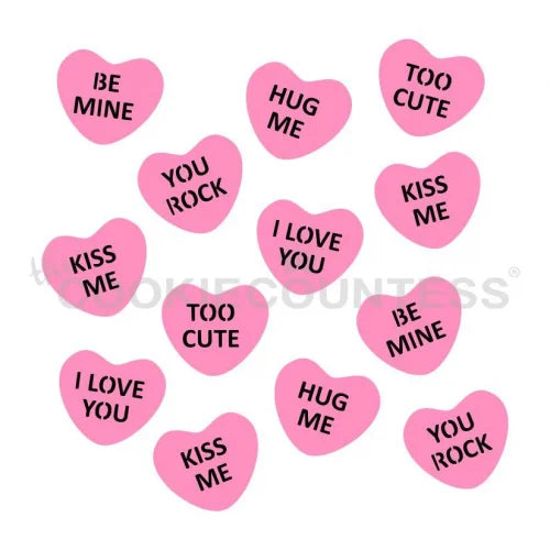 The Cookie Countess 2 Part Conversation Hearts stencil ontwerp met roze hartjes met lieve teksten zoals Be Mine, Hug Me, I Love You, Kiss Me en Too Cute, perfect stencil voor het decoreren van Valentijnsdag koekjes