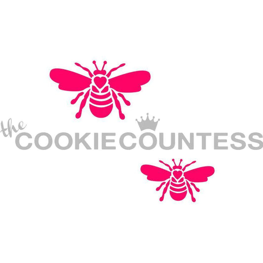 The Cookie Countess Bees stencil ontwerp met twee schattige roze bijen met hartvormige lijfjes en gedetailleerde vleugels, perfect stencil voor het decoreren van koekjes met een lief bijenthema met airbrush of royal icing