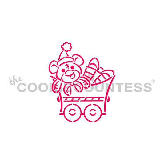 The Cookie Countess Christmas Train Teddy Bear stencil ontwerp met schattige teddybeer in een kersttrein wagon vol cadeautjes en zuurstok, leuk kerststencil voor het decoreren van koekjes met airbrush of royal icing
