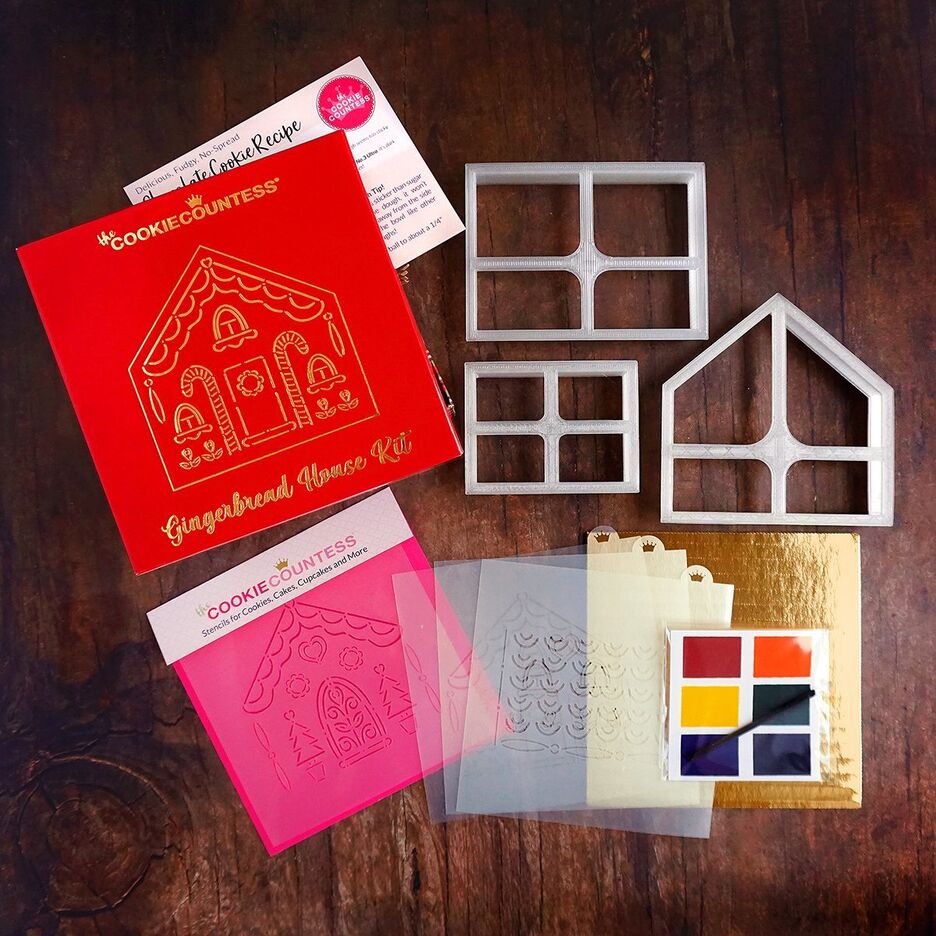 De vier stencils en drie uitstekers uit de Gingerbread House Kit