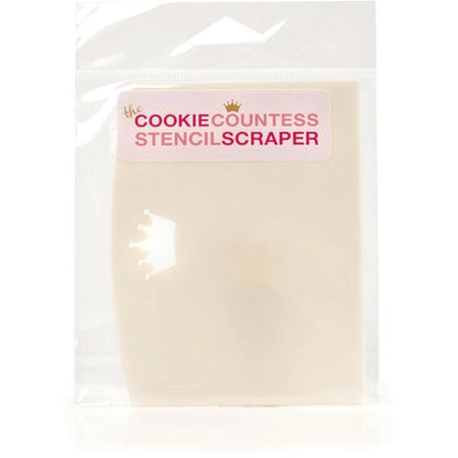 The Cookie Countess Stencil Scraper in doorzichtige verpakking met kroon logo, flexibele kunststof scraper voor het strak aanbrengen van royal icing op koekjes met stencils