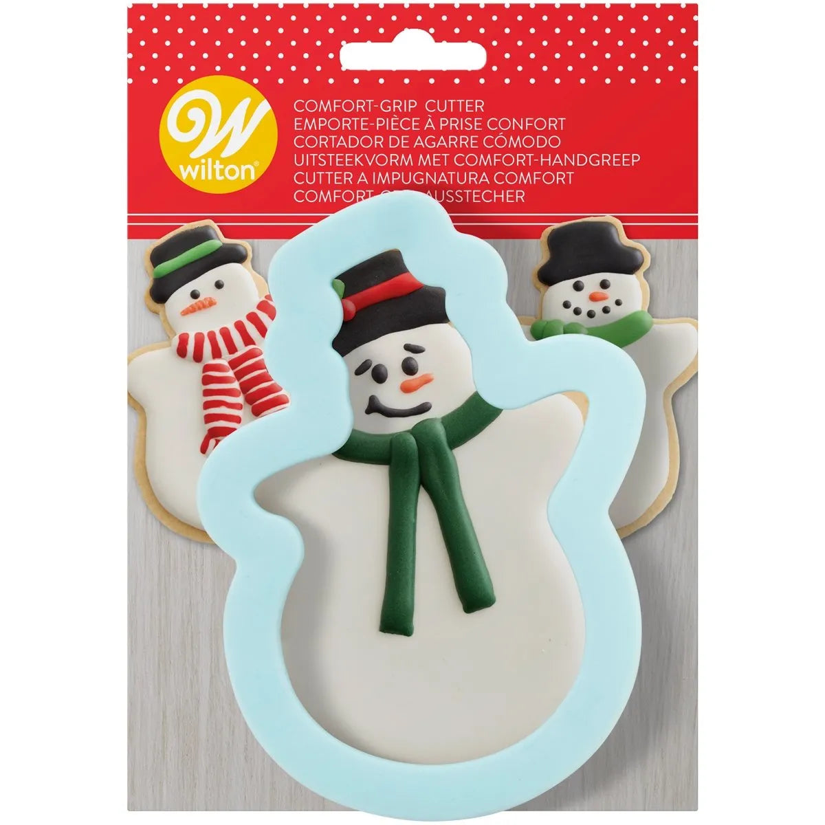 Wilton Comfort Grip Uitsteker Sneeuwpop verpakking met lichtblauwe sneeuwpop-uitsteker en versierde voorbeeldkoekjes met hoed, sjaal en wortelneus, ideale koekjesuitsteker voor het maken van kerstkoekjes